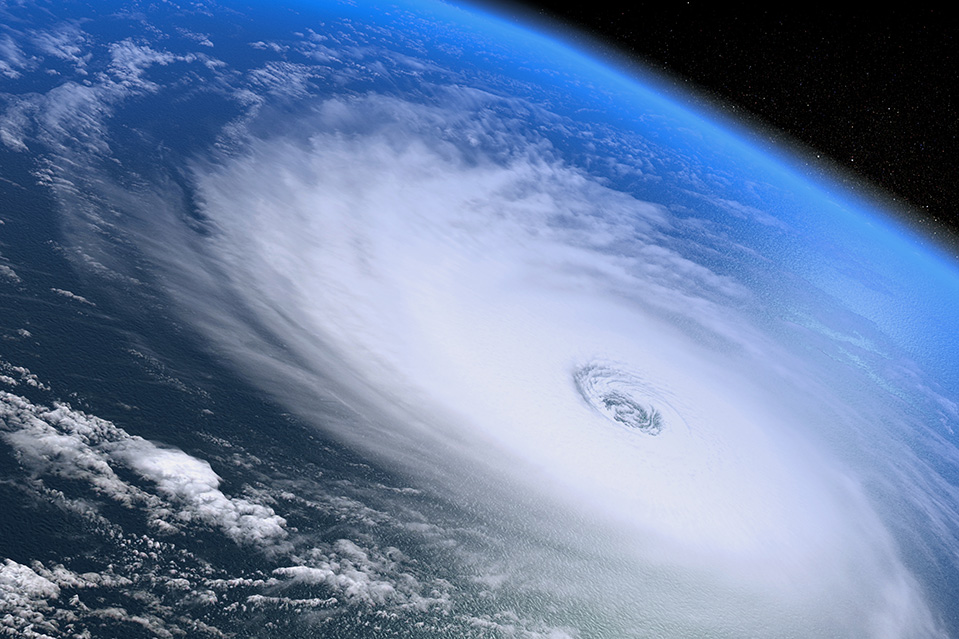 A satellite view of a hurricane forming over the earth