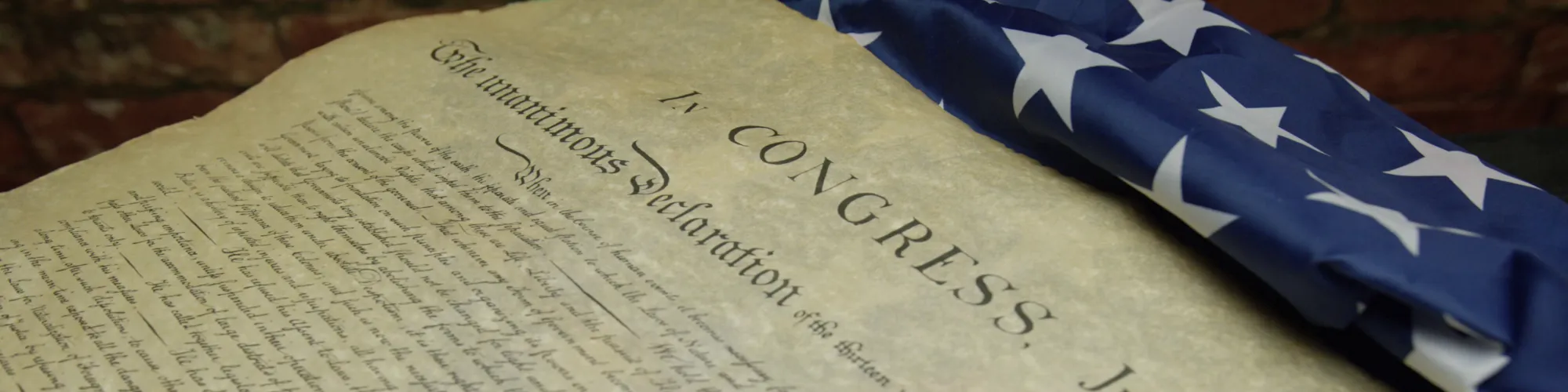Declaration of Independence next to American flag